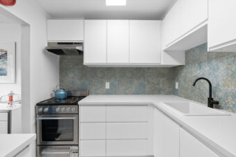 #105 – 1875 W 8th Avenue